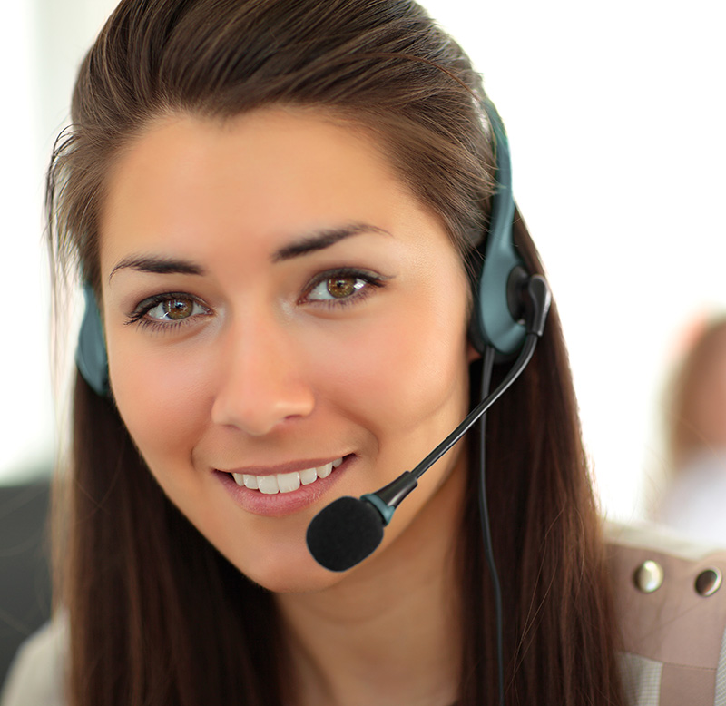 Female customer support operator with headset and smiling